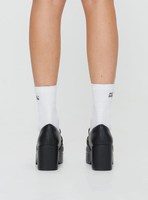 Faux leather platform loafers Slip-on design, padded footbed, treaded sole, rounded toe