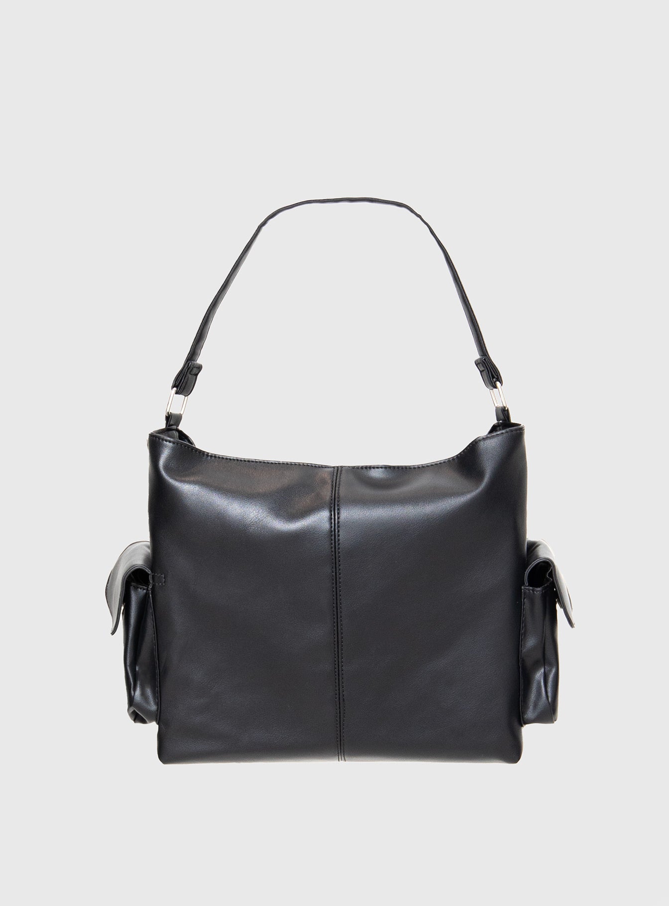 Faux leather bag Adjustable & removable shoulder and crossbody straps, silver-toned hardware, zip fastening, four external magnetic button fastening pockets, flat base