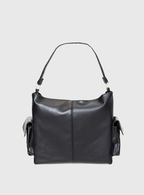 Faux leather bag Adjustable & removable shoulder and crossbody straps, silver-toned hardware, zip fastening, four external magnetic button fastening pockets, flat base