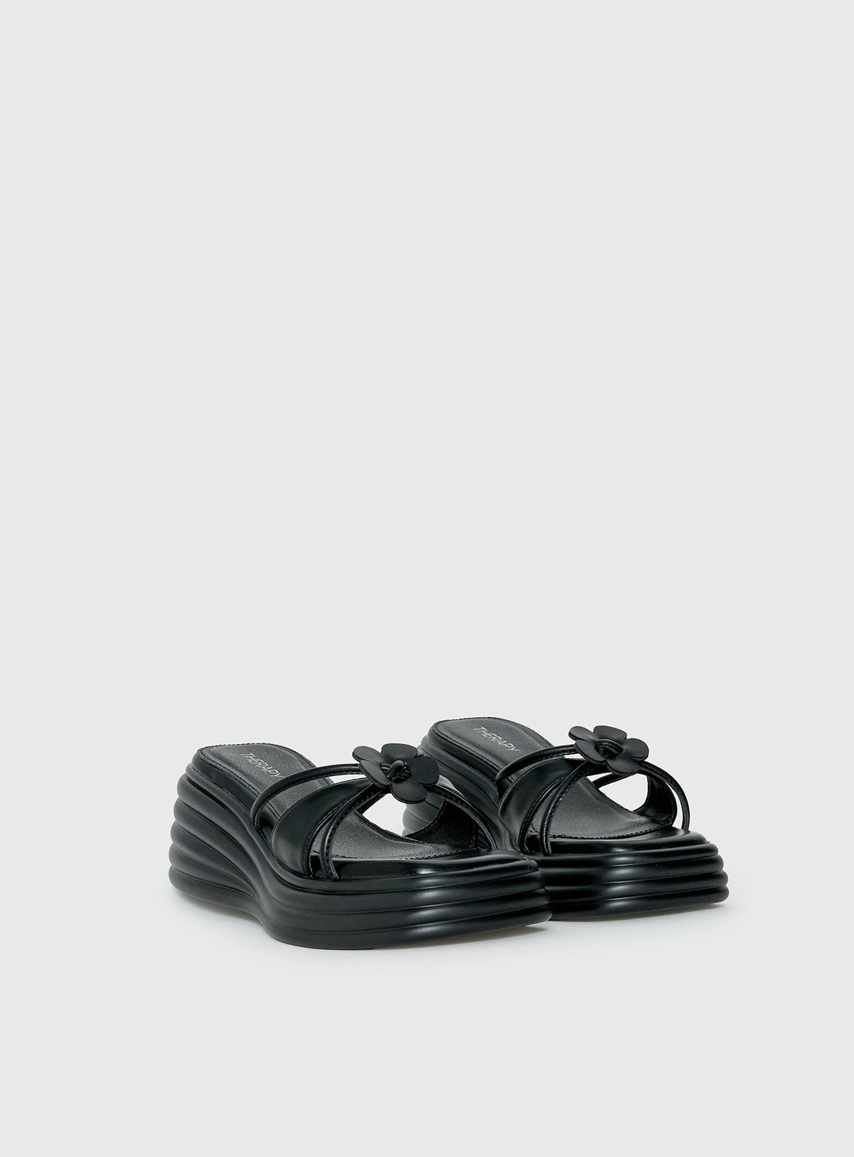 Therapy Flaunt Plateau-Sandalen mit Blumen-Detail Schwarz