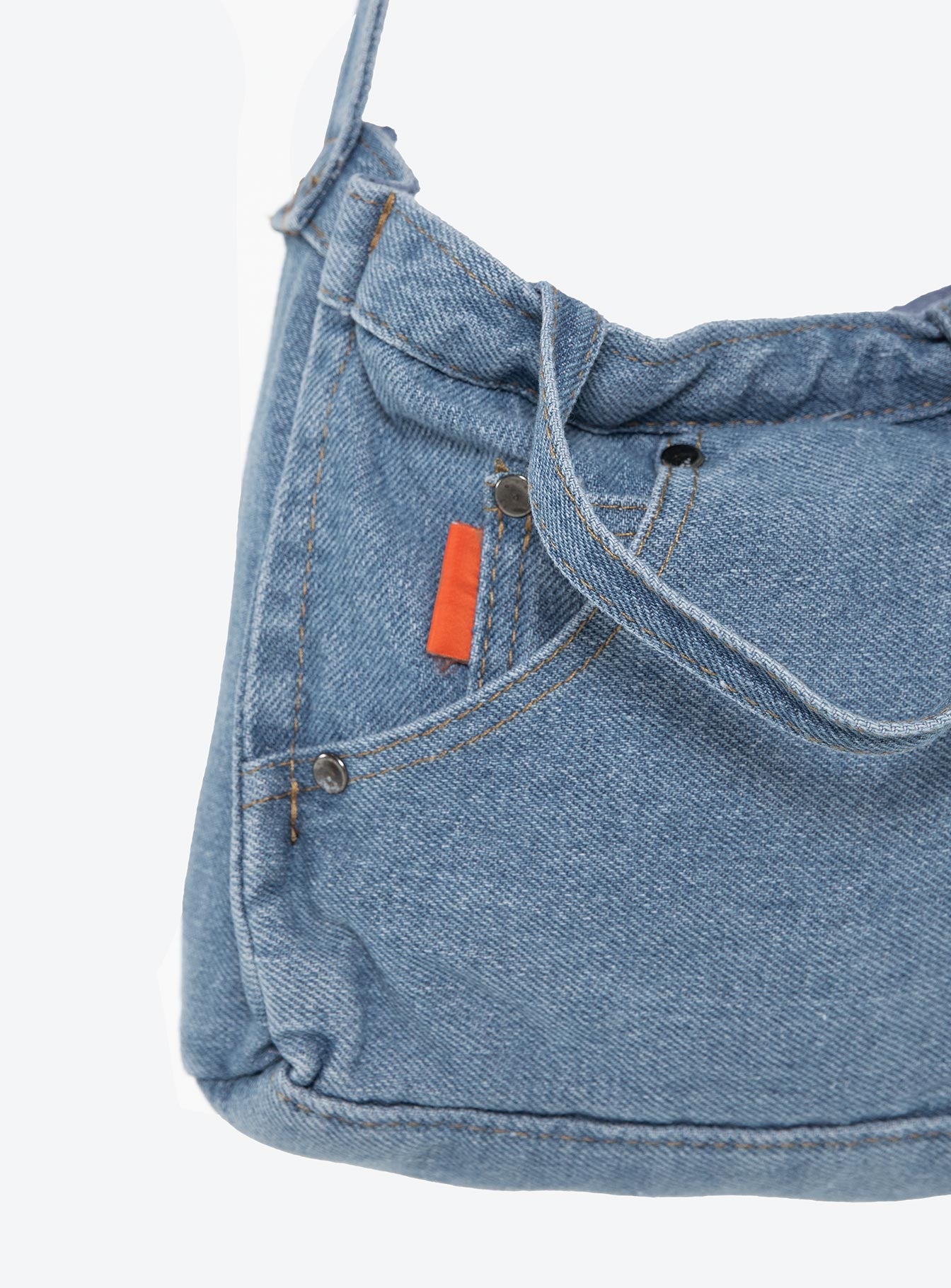 Denim crossbody bag Adjustable crossbody strap, fixed shoulder straps, zip fastening