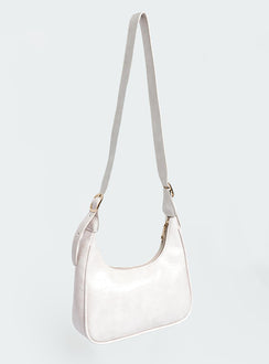 Shoulder bag Adjustable shoulder strap  Gold-toned hardware   Zip fastening  Single internal zip pocket  Flat base 