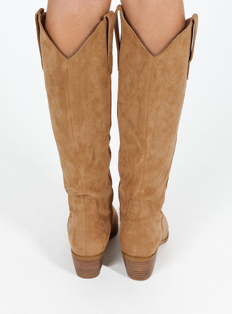 Cowboy boots Faux suede material  Detail stitching  Knee high length  Rounded hem  Pull tabs  Pointed toe  Fully lined