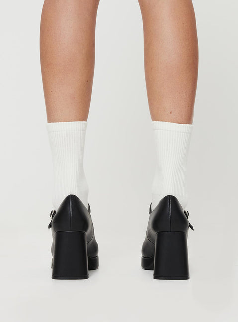 Faux leather loafer heels Single strap upper, silver-toned hardware, block heel, platform base, rounded toe