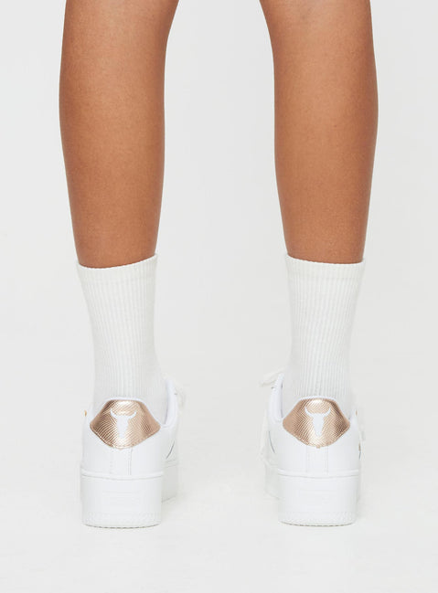 Faux leather sneakers Rounded toe, lace fastening, gold-toned hardware, platform base, passed footbed, treaded sole