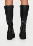 Knee High Boots Platform base, round toe, block heel, padded footbed Zip fastening at side