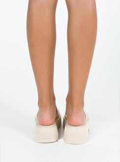 Slides Rounded close toe Slide on design Treaded sole Padded footbed