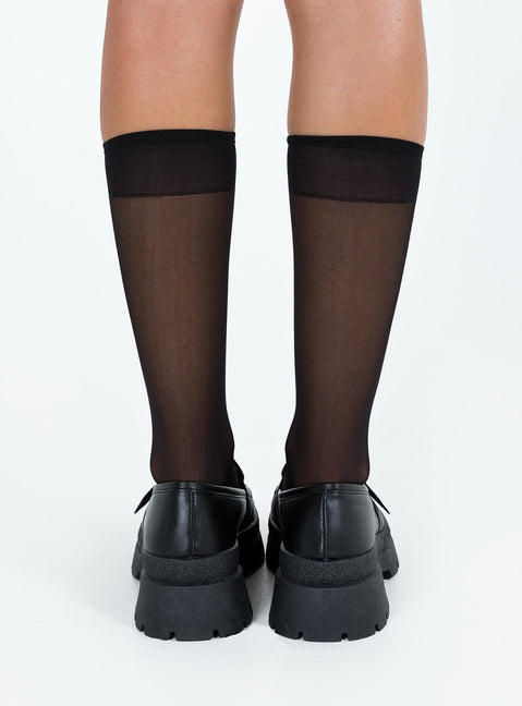 Loafer Faux leather material Gold toned buckle Rounded toe Platform base Padded footbed Treaded sole