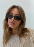 Sunglasses Slim arms and frame Moulded nose bridge Smoke tinted lens