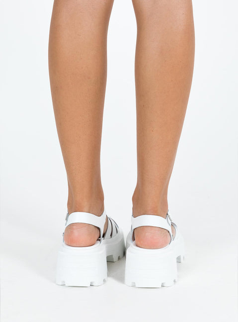 Sandals Faux leather material Platform base Strappy upper Buckle fastening Silver-toned hardware Treaded sole Padded footbed