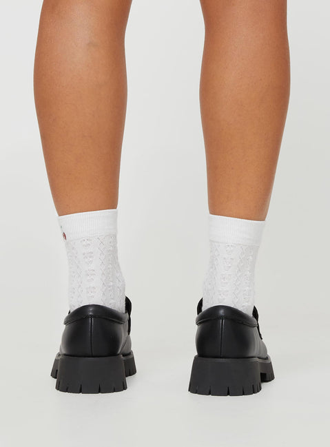 Faux leather platform loafers Slip-on design, padded footbed, treaded sole, rounded toe