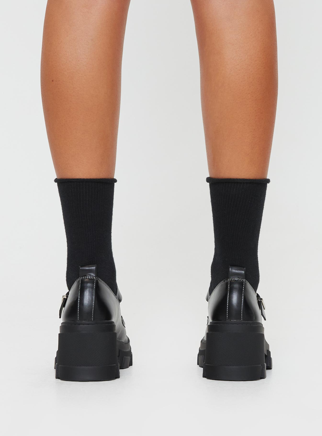 Mary jane heels  Faux leather single strap upper, contrast stitching, treaded sole, platform style, buckle fastening with silver-toned hardware