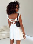 Front view of model wearing  front Princess Polly Square Neck  Castillo Mini Dress White