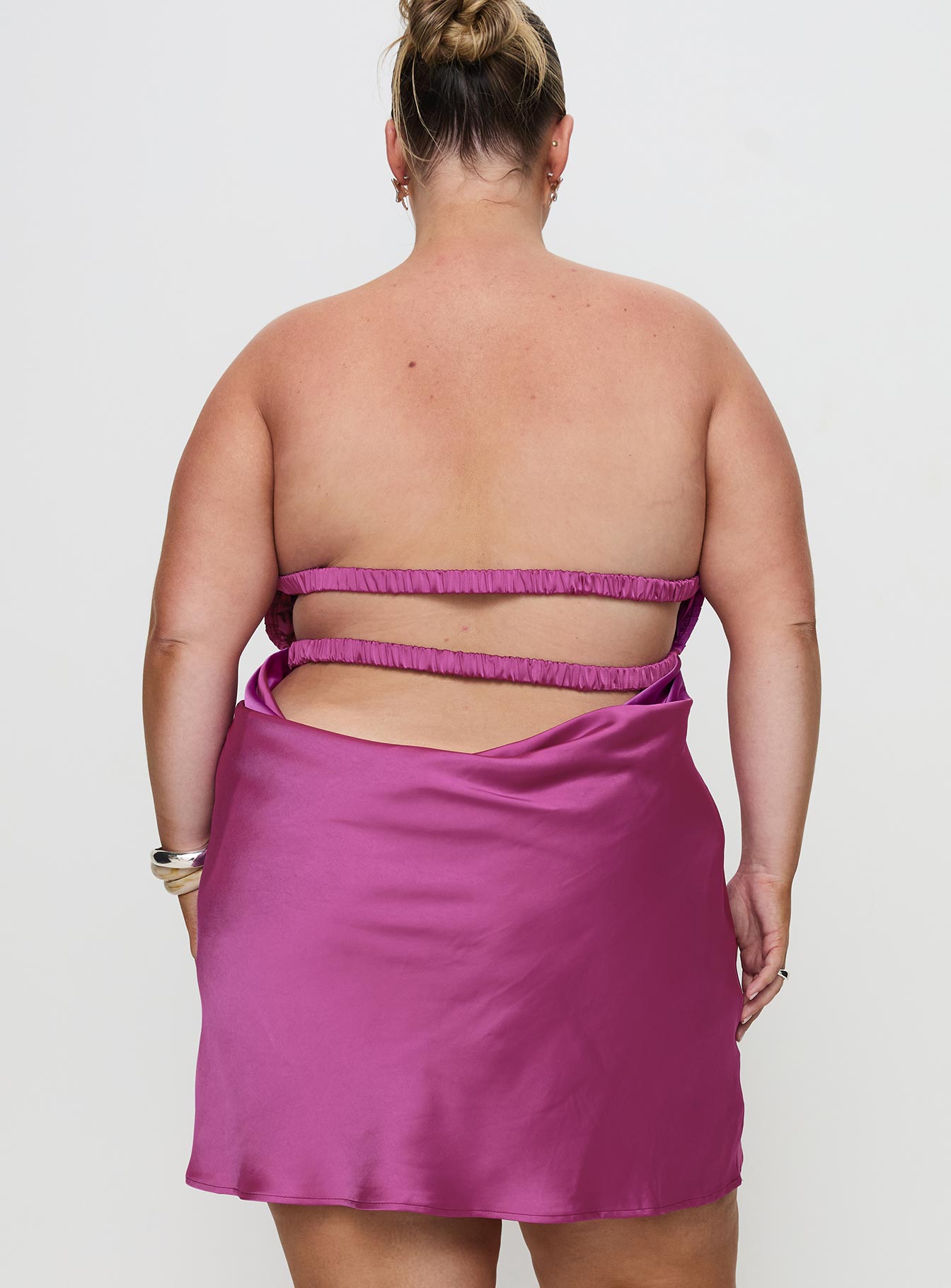 back view of model wearing Princess Polly Faviola Mini Dress Purple Curve Sweetheart Neckline 