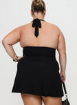 back view of model wearing Princess Polly Tinisie Halter Mini Dress Black Curve Plunger 