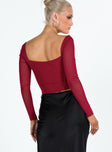 back view of model wearing Princess Polly Bruna Top Long Sleeve Red Lower Impact Full Sleeves Sweetheart 