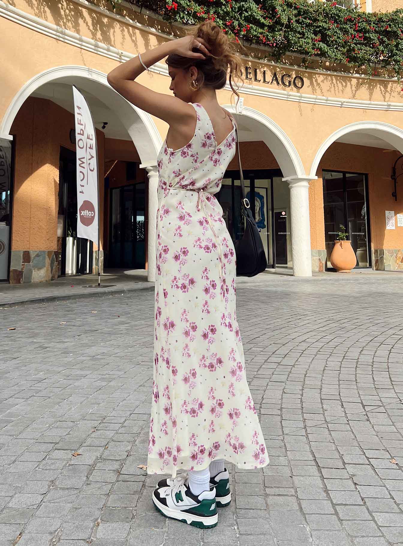 back view of model wearing Princess Polly Nellie Midi Dress Yellow Floral Petite Plunger 