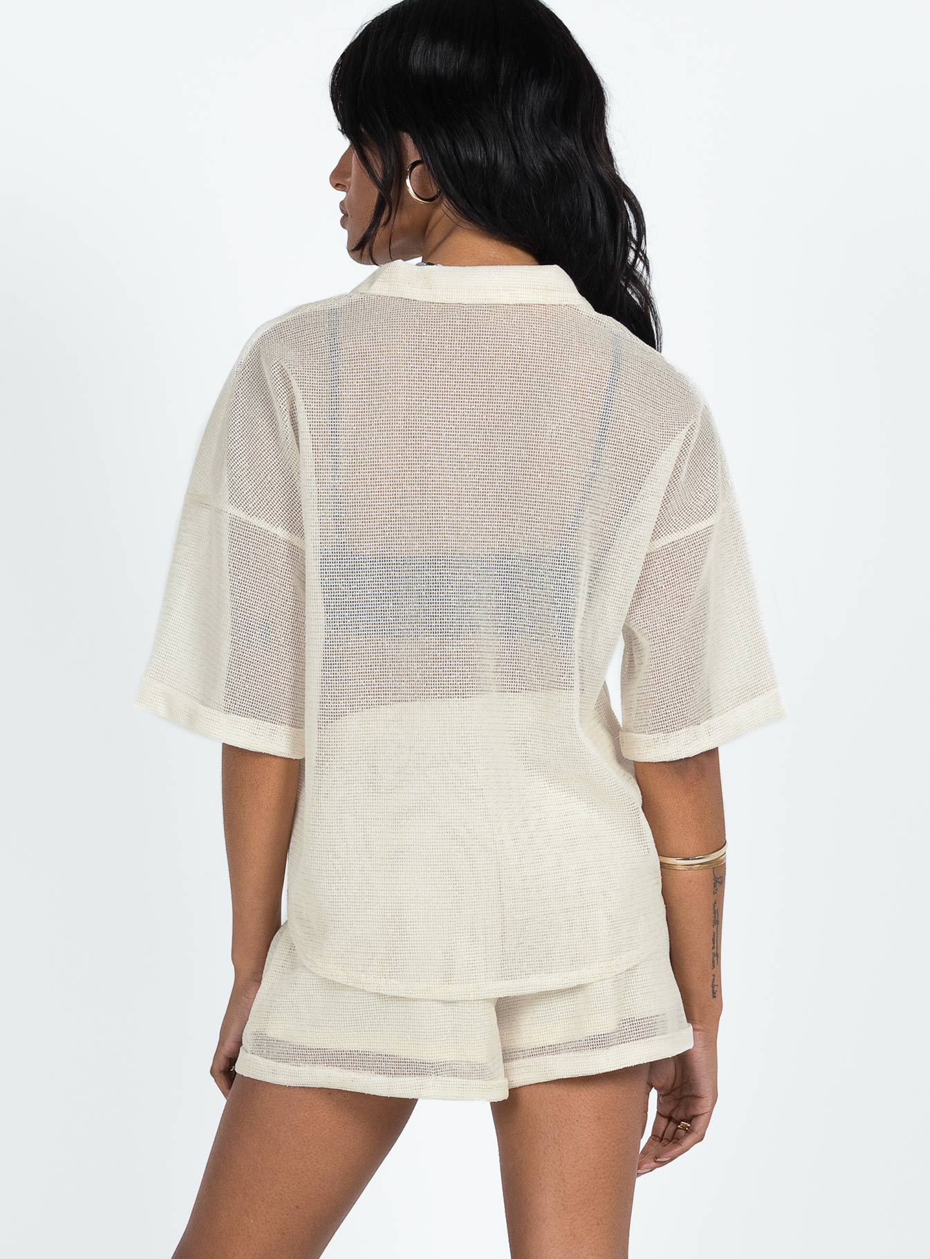 Matching set Sheer material Button up shirt Classic collar Button fastening at front Drop shoulder  Twin chest pockets Shorts High rise Elasticated waistband