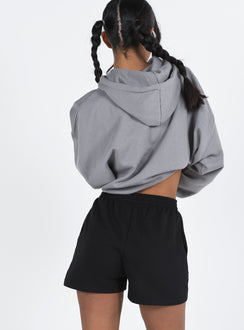 back view of model wearing Princess Polly Cenzo Track Shorts Black High Waisted Shorts 