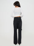 back view of model wearing Princess Polly Kemsley Mid Rise Bootleg Jeans Washed Black Mid Rise 