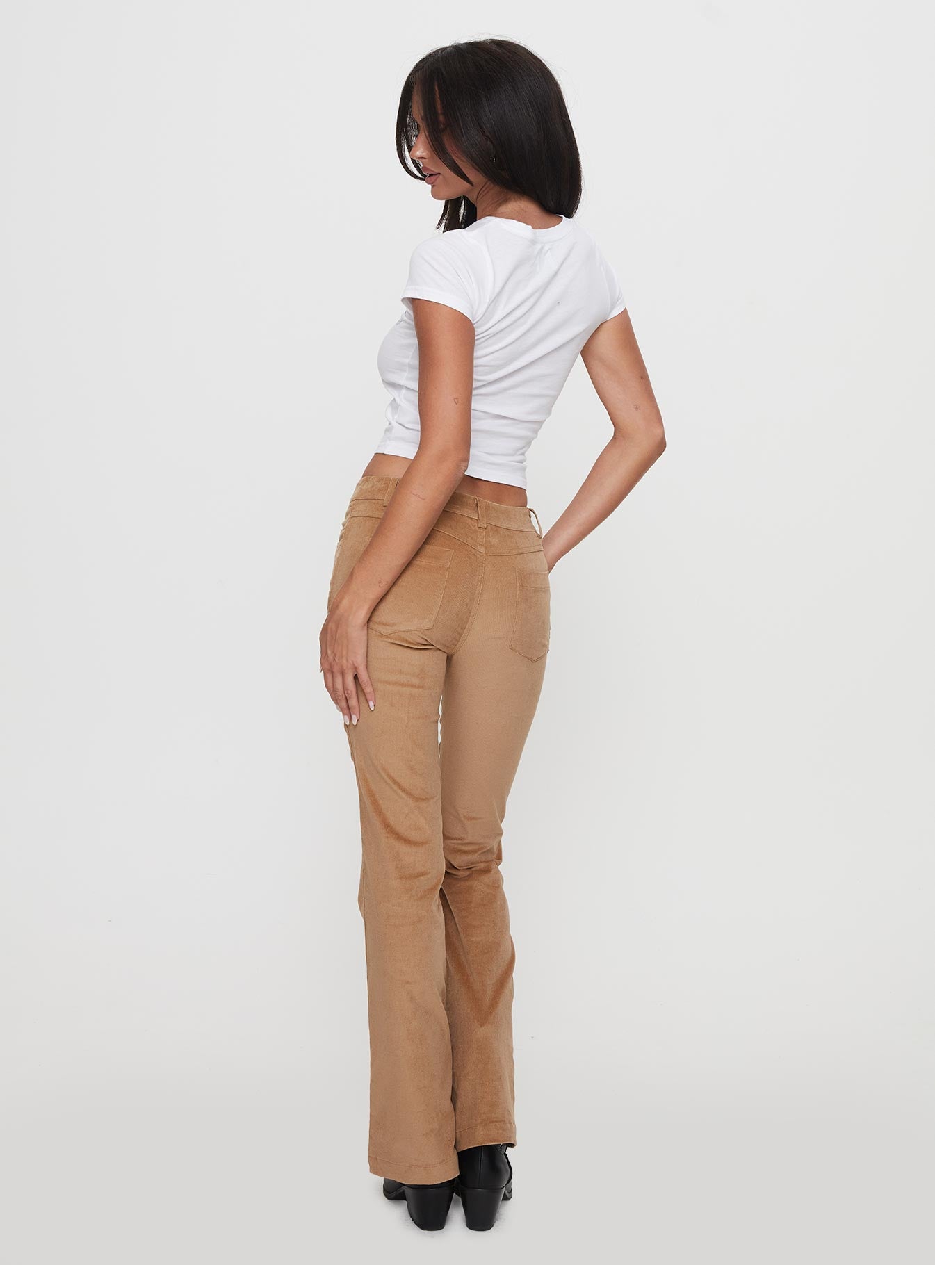 back view of model wearing Princess Polly Troubadour Low Waist Jeans Tan 