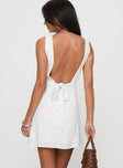 back view of model wearing Princess Polly Tortellini Mini Dress White / Black Stripe Plunger 