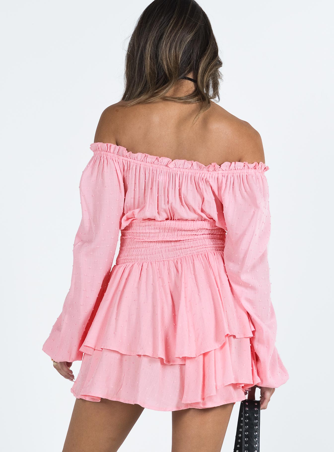 Long sleeve romper Soft textured material Shirred waistband Ruffle detailing Elasticated neckline and cuffs Can be worn on or off the shoulder Good stretch  Fully lined