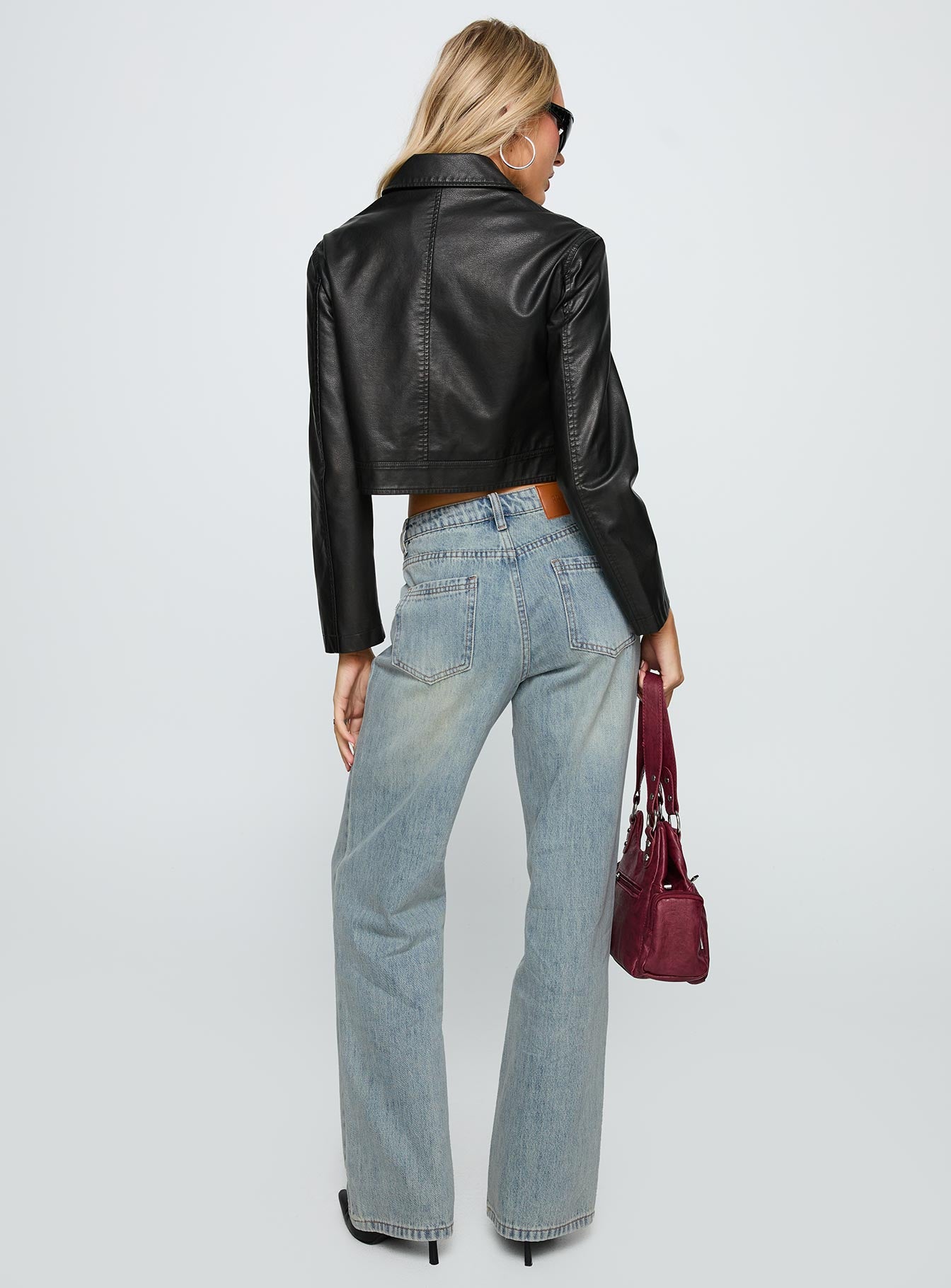 back view of model wearing Princess Polly Echo Park Jeans Vintage Wash Jean Mid Rise 