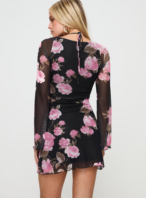 back view of model wearing Princess Polly Bilbao Long Sleeve Mini Dress Black / Floral Square Neck 