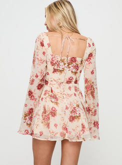 back view of model wearing Princess Polly Valentin Long Sleeve Mini Dress Floral Square Neck 