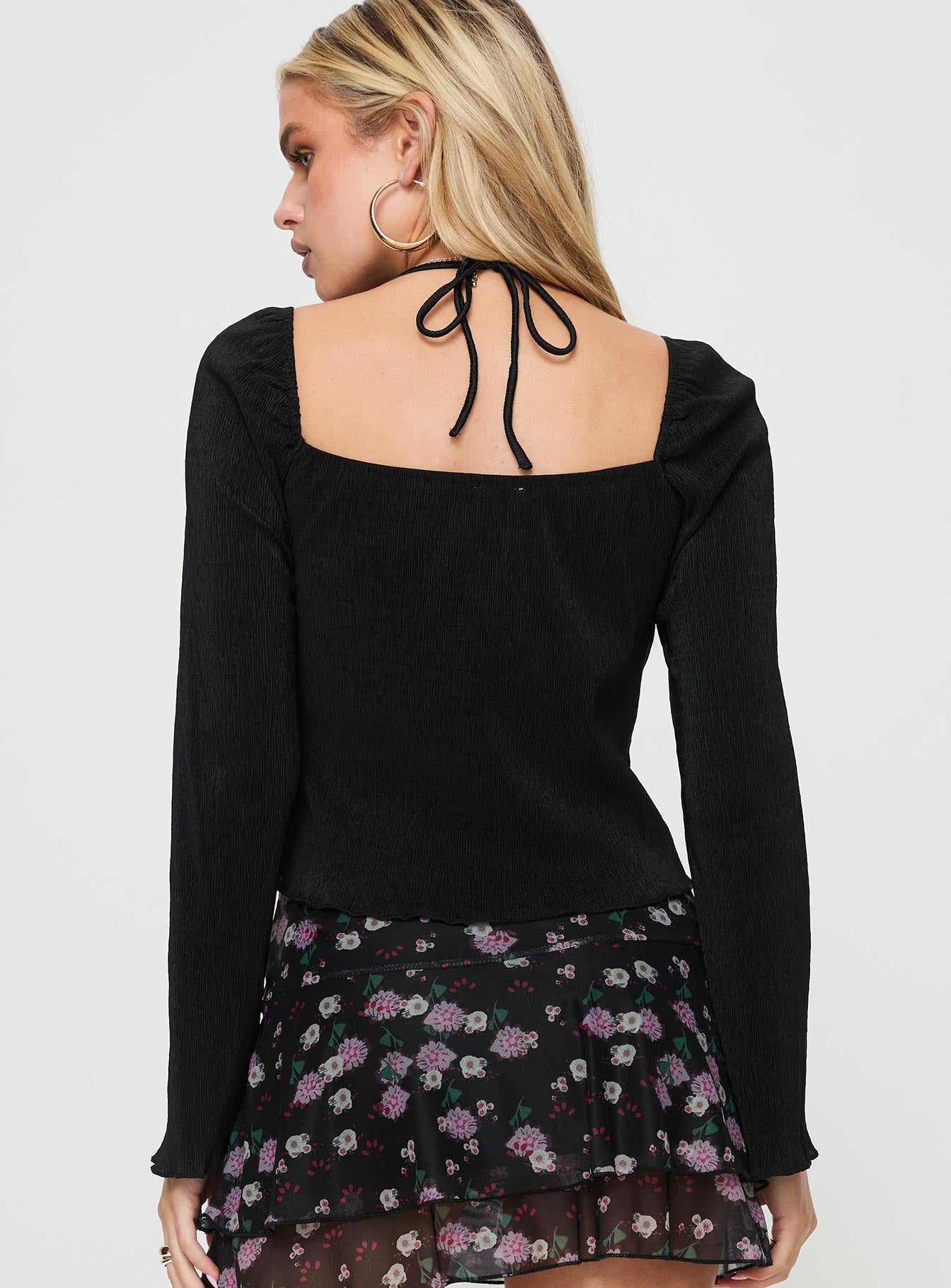 back view of model wearing Princess Polly Chantria Long Sleeve Halter Top Black Full Sleeves Plunger 