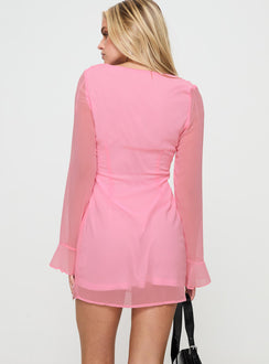 back view of model wearing Princess Polly Marisela Long Sleeve Mini Dress Pink V-Neck 