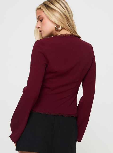 back view of model wearing Princess Polly Hagner Long Sleeve Top Burgundy Full Sleeves V-Neck 