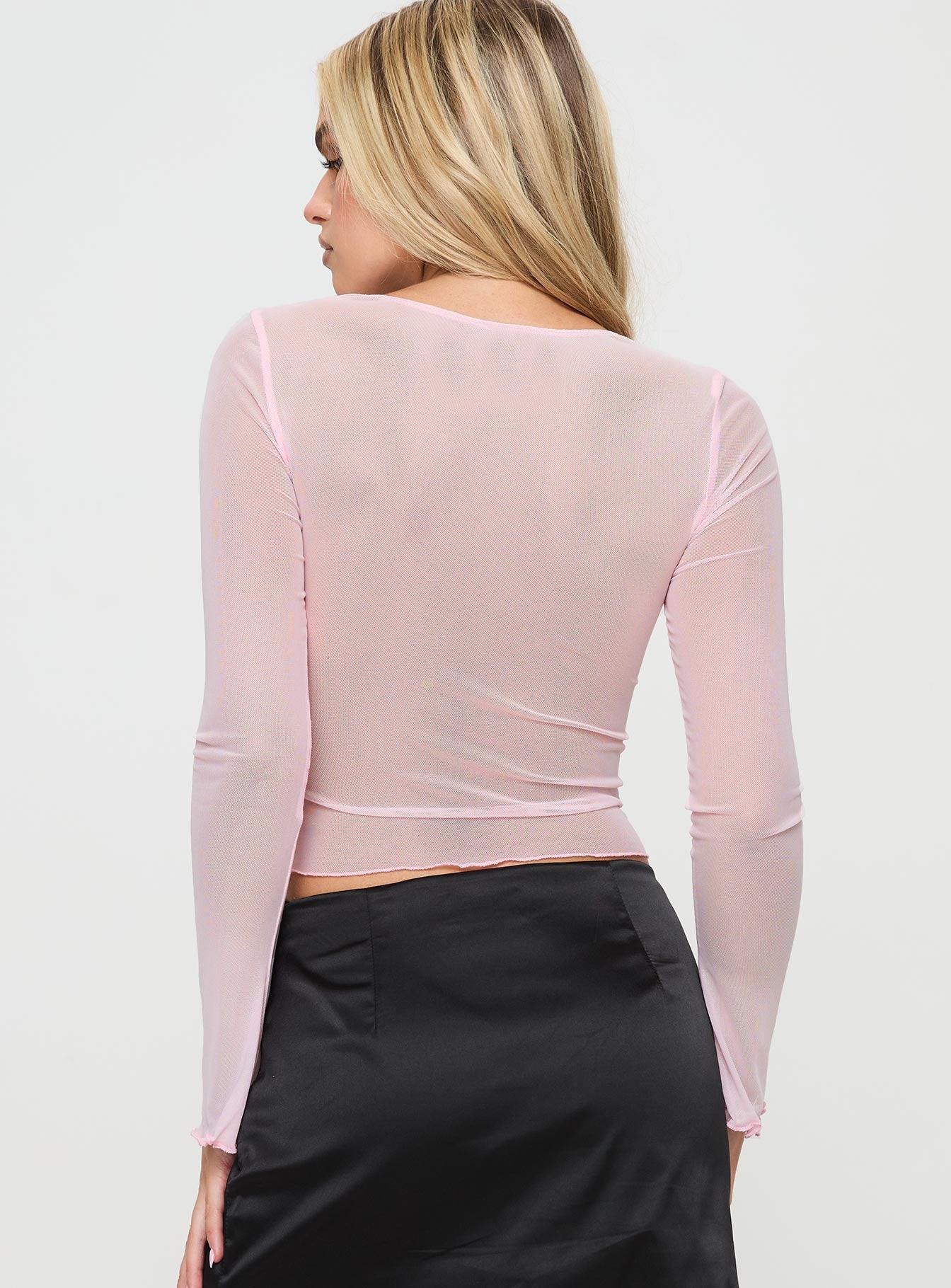 back view of model wearing Princess Polly Potential Long Sleeve Top Pink Full Sleeves Plunger 