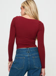 back view of model wearing Princess Polly Selenie Long Sleeve Top Red Full Sleeves Square Neck 