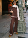 side view of model wearing Princess Polly Square One Pants Brown / Cream High Waisted Pants 