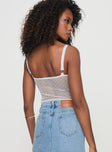 back view of model wearing Princess Polly Tadeo Lace Cami Top White Sleeveless Square Neck 