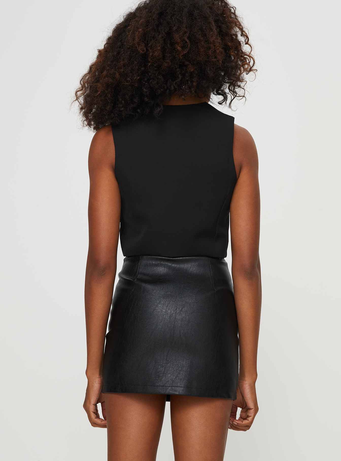 back view of model wearing Princess Polly Khalie Faux Leather Mini Skirt Black Mini Skirts 