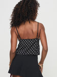 Cami top Polka dot print, v-neckline, lace detail on bust, adjustable strap Non-stretch material, fully lined 