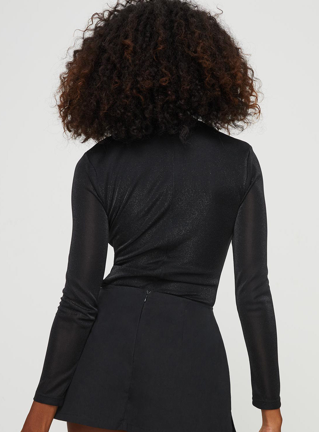 back view of model wearing Princess Polly Knighton Long Sleeve Bodysuit Black Full Sleeves Crew Neck 