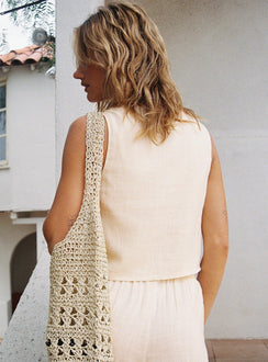 back view of model wearing Princess Polly Grazia Vest Top Cream / Red Sleeveless Plunger 