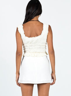 back view of model wearing Princess Polly Selby Mini Skirt White Tall Mini Skirts 