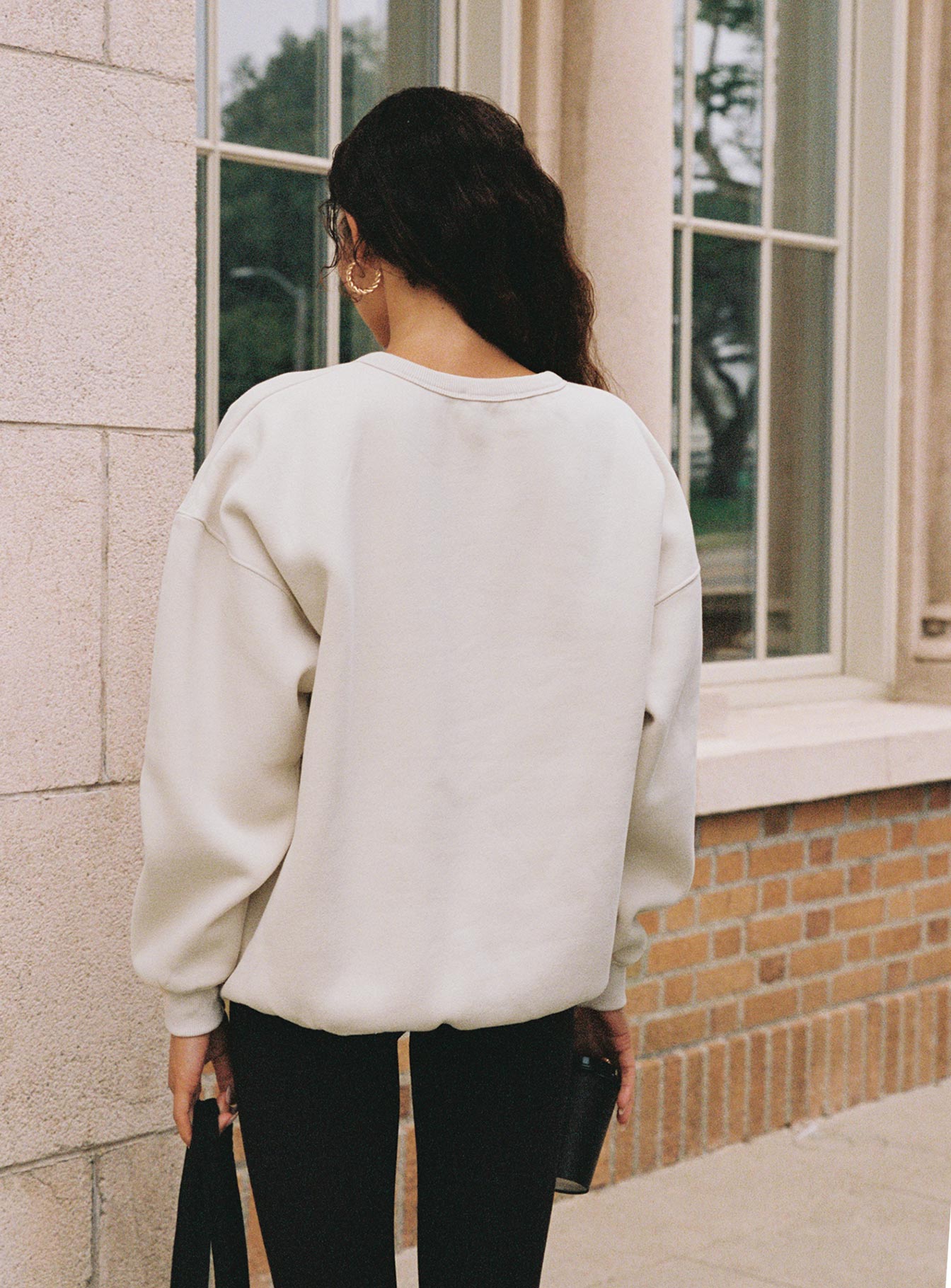 back view of model wearing Princess Polly Dream Fleece Classic Crewneck Sweater Beige 