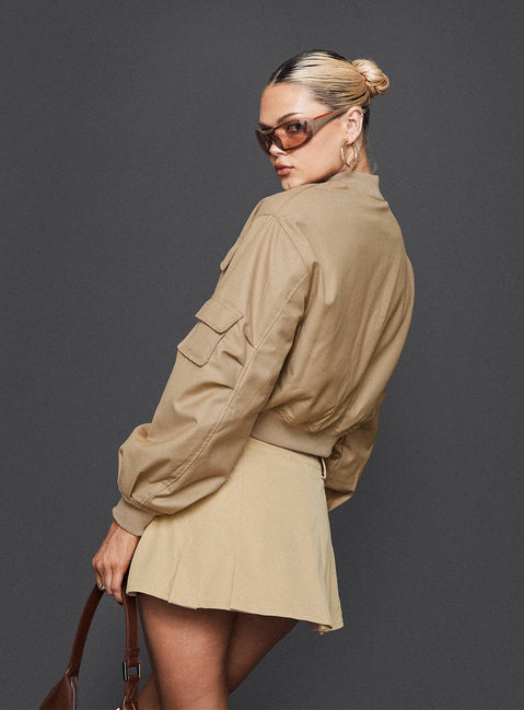 back view of model wearing Princess Polly Calianna Pleated Mini Skort Camel High Waisted Shorts 