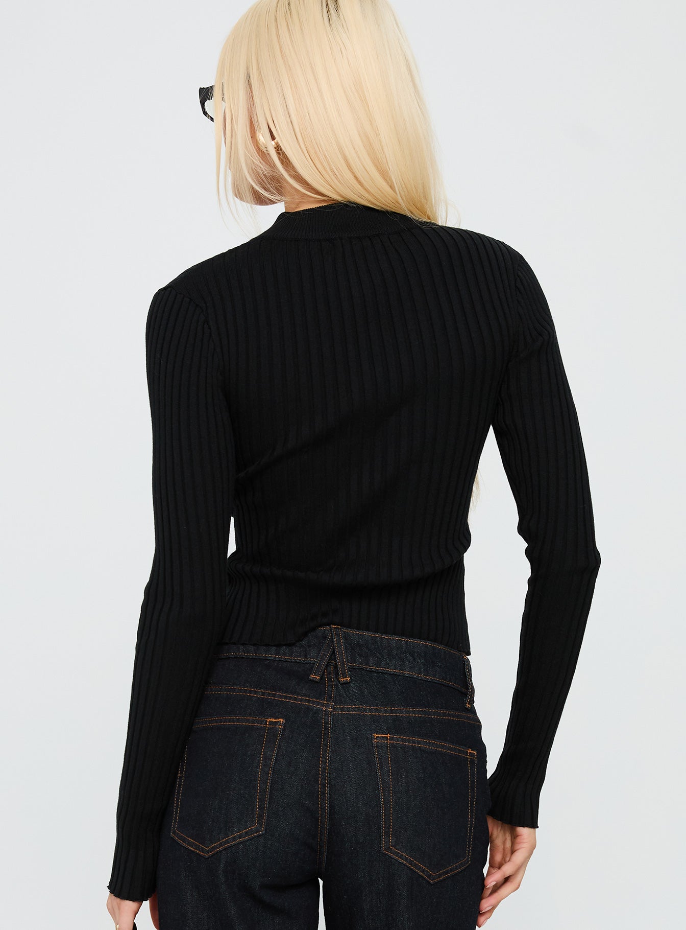 back view of model wearing Princess Polly Decisive Zip Through Knit Sweater Black / White cropped 
