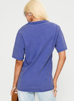 back view of model wearing Princess Polly Dodge 1969 Oversized Graphic Top Blue Half Sleeves Crew Neck 