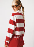 back view of model wearing Princess Polly SDSU Rugby Polo Red / White Full Sleeves High Neck 