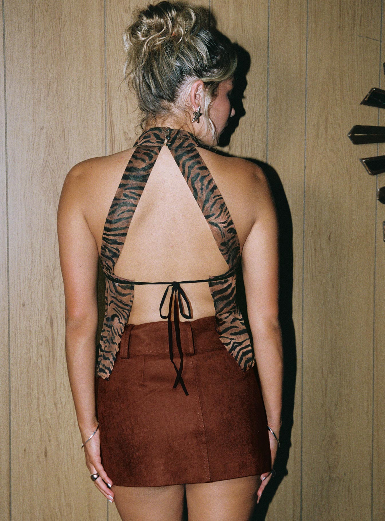 back view of model wearing Princess Polly Movita Belted Mini Skirt Brown 