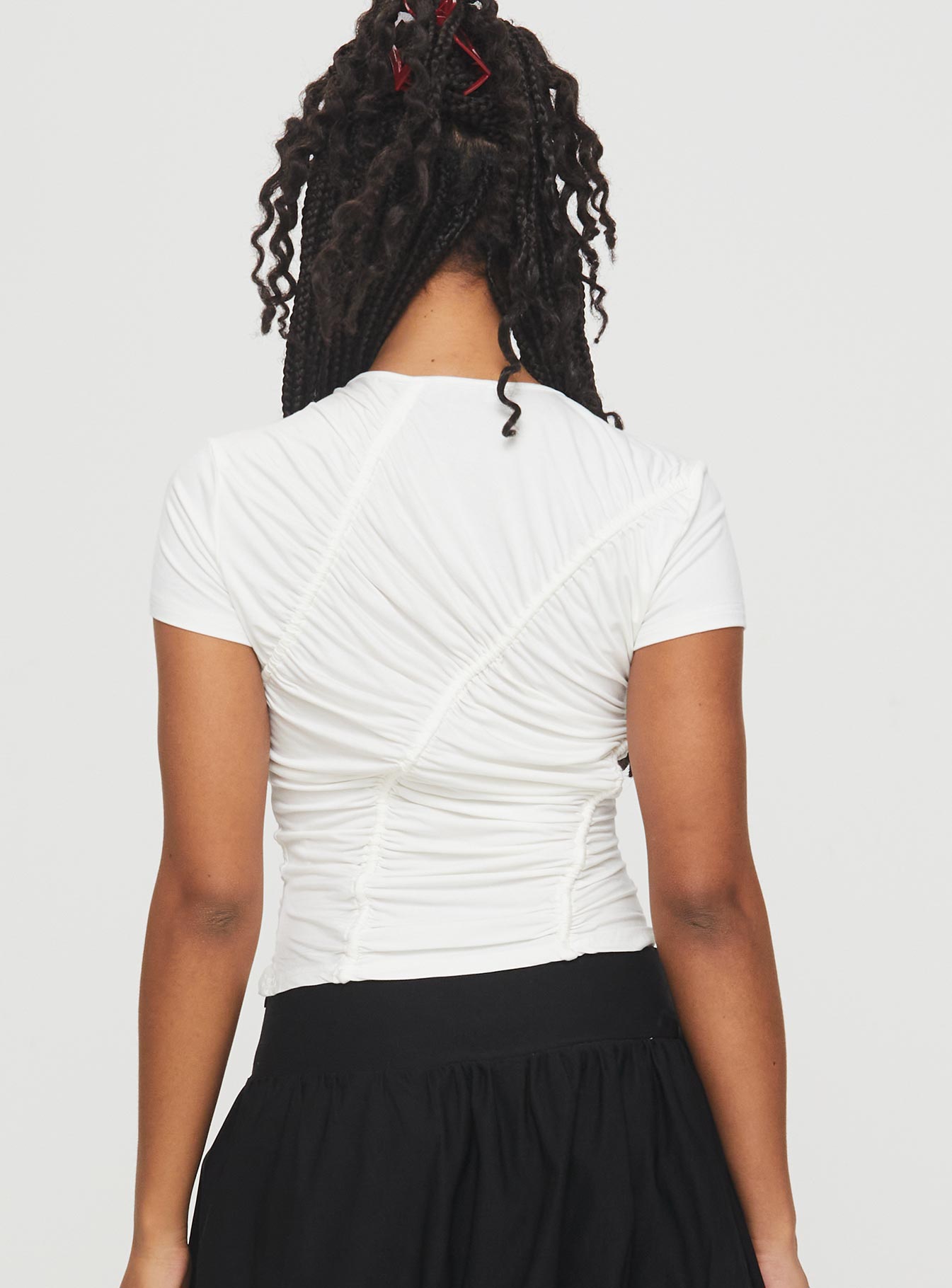 back view of model wearing Princess Polly Pettle Top White Short Sleeves Crew Neck 