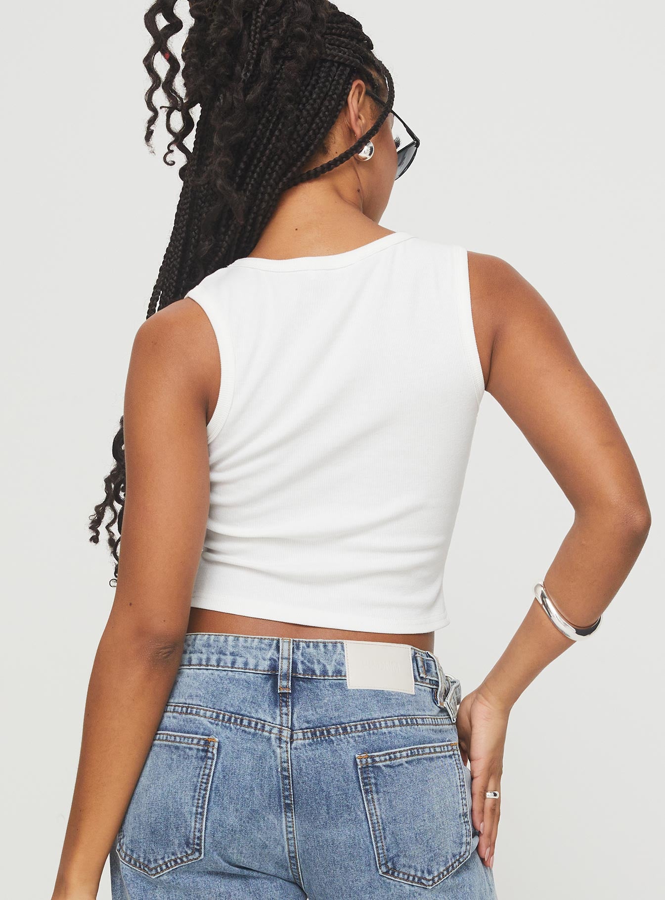 back view of model wearing Princess Polly Somer Top White Sleeveless Scoop Neck 